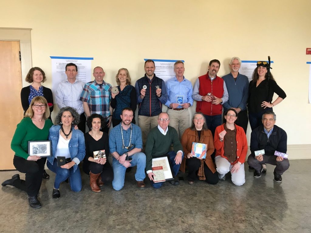 Members of the Willamette River Advisory Group showcase objects important to them at one of their planning meetings in 2018.